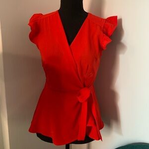 Red Top with tie belt and v neck and ruffle short sleeves